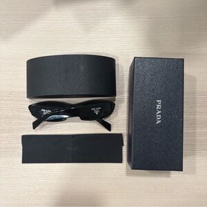 Prada Elegant Black Sunglasses Set
